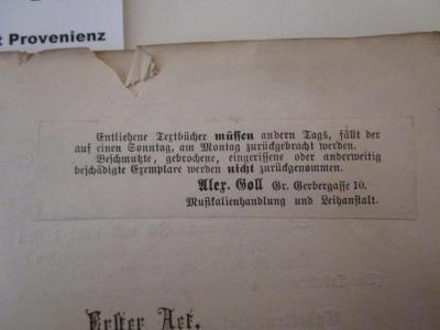  Arien und Gesänge aus Fatinitza : Komische Oper in drei Acten (1877);- (Alex Goll (Danzig)), Etikett: Name, Buchhändler, Ortsangabe; 'Entliehene Textbücher müssen andern Tags, fällt der auf einen Sonntag, am Montag zurückgebracht werden.
Beschmutzte, gebrochene, eingerissene oder anderweitig beschädigte Exemplare werden nicht zurückgenommen.
Alex. Goll Gr. Gerbergasse 10.
Musikalienhandlung und Leihanstalt.'.  (Prototyp)