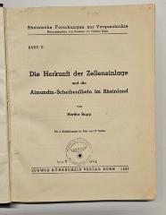 NF 1230 R946 : Die Herkunft der Zelleneinlage und die Almandin-Scheibenfibeln im Rheinland (1937)