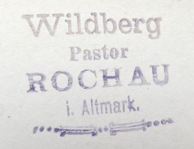 - (Wildberg, Johannes), Stempel: Name, Berufsangabe/Titel/Branche, Ortsangabe; 'Wildberg / Pastor / ROCHAU / i. Altmark.'. 