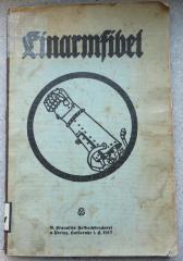 O 3151 : Einarm-Fibel. Ein Lehr-, Lese- und Bilderbuch für Einarmer. (1917)