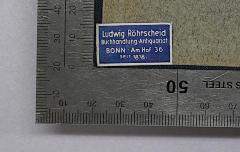 - (Röhrscheid, Buchhandlung und Antiquariat (Bonn)), Etikett: Buchhändler; 'Ludwig Röhrscheid Buchhandlung Antiquariat Bonn Am Hof 36 seit 1818'.  (Prototyp)
