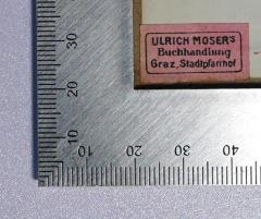 - (Ulrich Moser's Buchhandlung Graz), Etikett: Name, Ortsangabe, Berufsangabe/Titel/Branche; 'Ulrich Moser's Buchhandlung Graz Stadtpfarrhof'. 