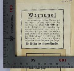 -, Etikett: Notiz; 'Warnung! Der Empfänger dieses Buches hat sich sofort zu vergewissern, ob sich das Buch in unversehrtem Zustande befindet. Ist dasselbe beschmutzt, beschrieben, oder sonst wie beschädigt, so hat dies der Gefangene sofort dem Aufseher zu melden. Die Unterlassung der Meldung hat Bestrafung und Ersatz des Buches auf Kosten des Gefangenen zur Folge. Die Direktion des Landesgefängnisses.'