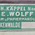 - (Joh. Käppel Nachf. E. Wolff (Luckenwalde)), Etikett: Buchhändler, Ortsangabe, Name; 'Joh. Käppel Nachf. E. Wolff
Buch- u. Papierhandlung
Luckenwalde'.  (Prototyp)