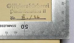 - (Offizierbücherei Pionierbataillon 11), Stempel: Berufsangabe/Titel/Branche, Nummer; 'Offizierbücherei Pionierbataillon 11 Nr. IX./26.'. 