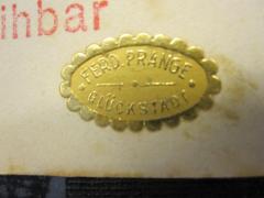- (Prange, Ferd.), Etikett: Besitzwechsel; 'Ferd. Prange Glückstadt'. 