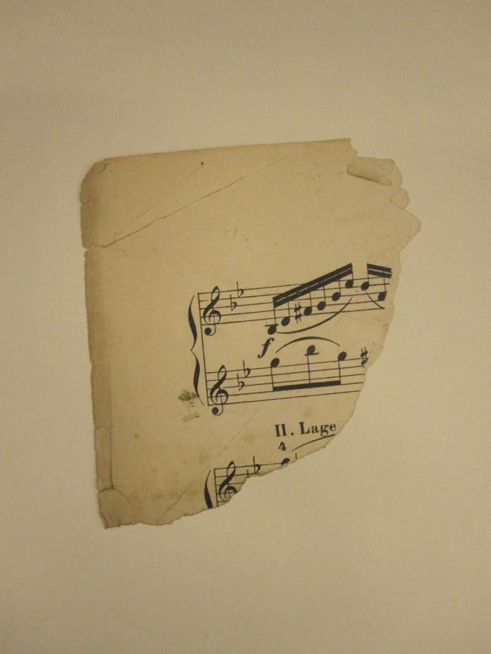  Schubert-Album : Sammlung der Lieder für eine Singstimme mit Pianofortebegleitung (o.J.);- (unbekannt), Papier: Notiz; '[Abriss eines Notenblattes]'. 
