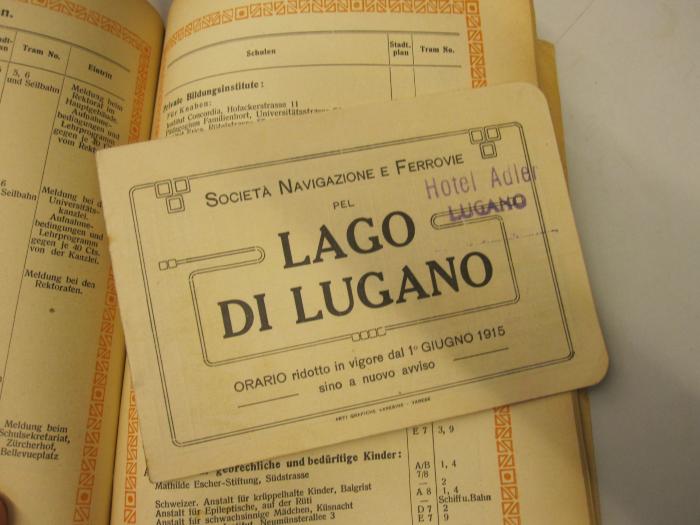  Zürich und Umgebung (1914);-, Stempel: Ortsangabe; 'Hotel Adler Lugano';-, Papier: Notiz; 'Società Navigazione e Ferrovie pel Lago di Lugano Orario ridotto in vigore dal 1° Giungo 1915 sino a nuovo avviso'