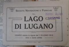 - (Società Navigazione del Lago di Lugano), Papier: Name, Ortsangabe, Datum; 'Società Navigazione e Ferrovie pel Lago di Lugano Orario ridotto in vigore dal 1° Giungo 1915 sino a nuovo avviso'. 