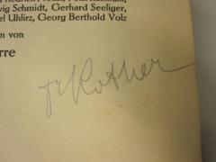 - (Rather[?], [?]), Von Hand: Autogramm, Name; '[.][?] Rother'. 