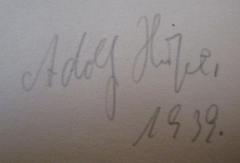 - (H[...], Adolf), Von Hand: Autogramm, Datum, Name; 'Adolf H[...]
1939.'. 