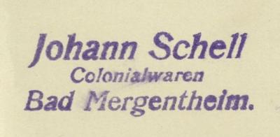 - (Johann Schell Colonialwaren (Bad Mergentheim)), Stempel: Berufsangabe/Titel/Branche, Name, Ortsangabe; 'Johann Schell
Colonialwaren
Bad Mergentheim.'.  (Prototyp)