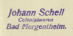 - (Johann Schell Colonialwaren (Bad Mergentheim)), Stempel: Berufsangabe/Titel/Branche, Name, Ortsangabe; 'Johann Schell
Colonialwaren
Bad Mergentheim.'.  (Prototyp)